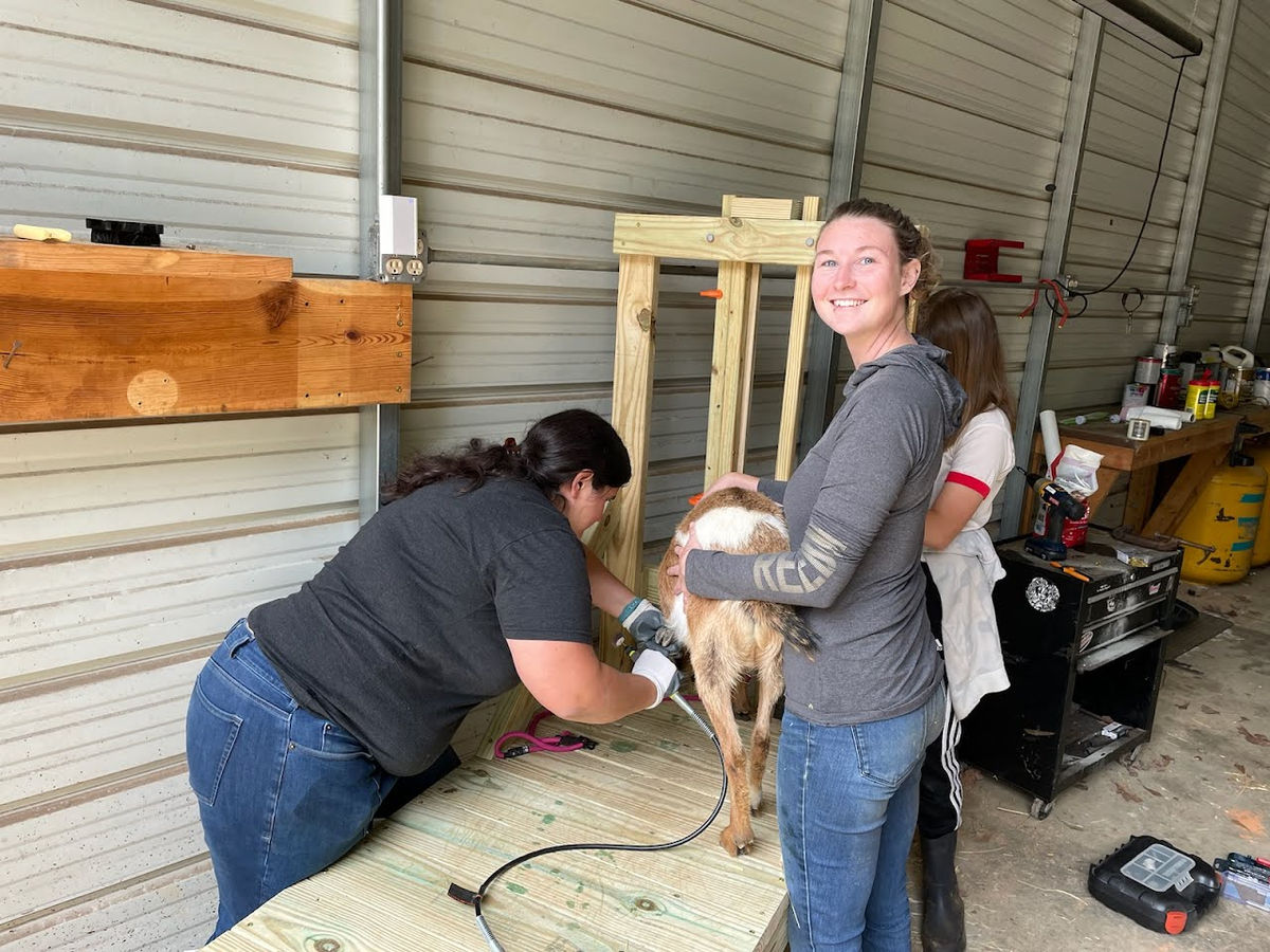Helping Alicia learn to do it herself!